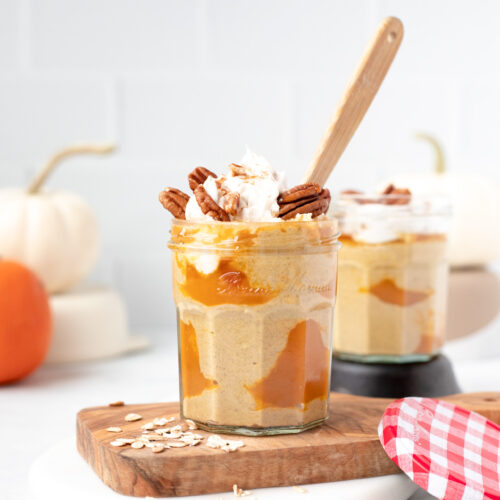 Pumpkin Pie Overnight Oats in a jar with a spoon