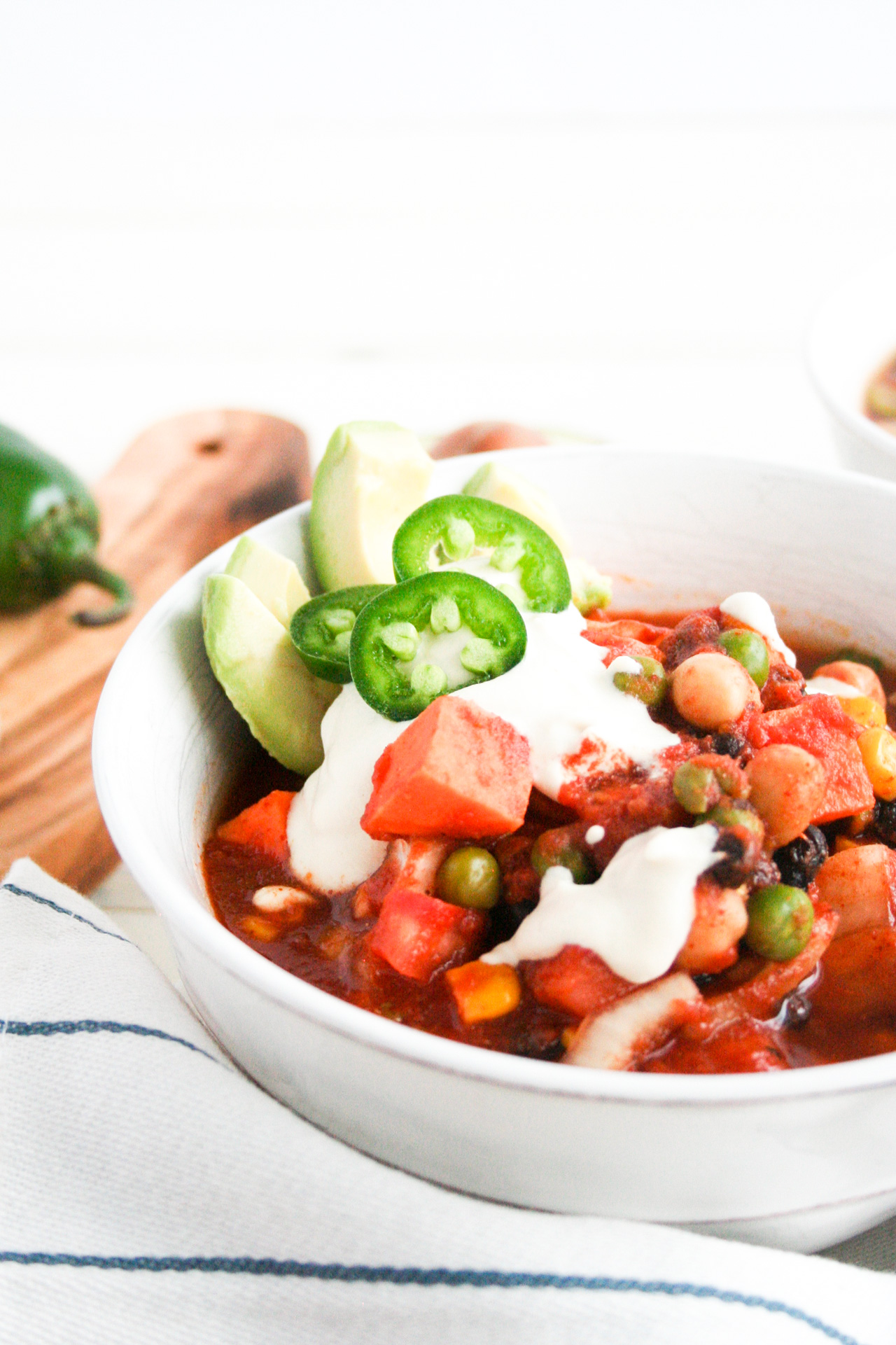 Vegan Chilli close up with jalapeno and avocado