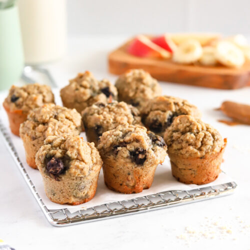 Healthy mini blueberry muffins on a cooling rack